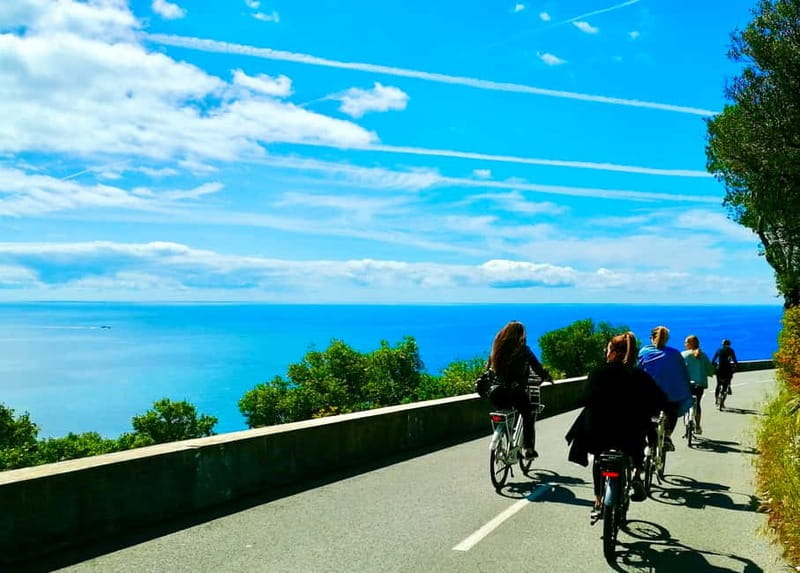 Ebike from Nice: Fantastic Villefranche's Bay & Saint-Jean - Cycling toward Villefranche-sur-Mer with Cap Ferrat views