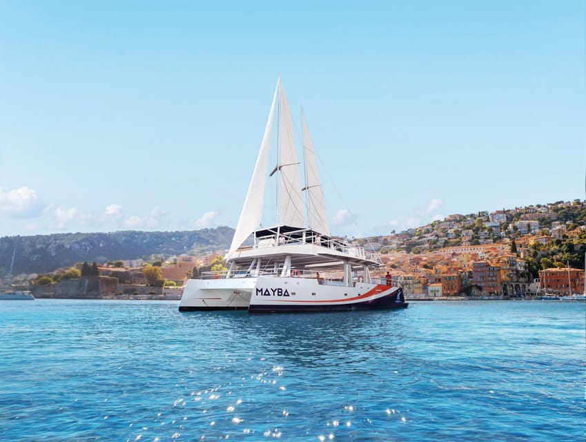 Nice : Dinner at Sea on a Maxi Catamaran - Villefranche, Cap Ferrat - The Night Program: Sunset Sail, Anchorage, and an Evening Buffet