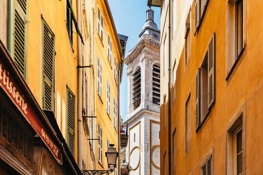 Nice: Old Town & Castle Hill Informative Guided Walking Tour - Starting at the Centenary Monument, then straight to Place Massena’s red facades