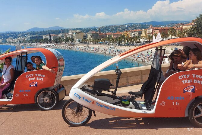 Nice: Visit of Nice by electrically assisted bike taxi 1 hour. - Masséna High School, Avenue Verdun, Place Magenta, and the Promenade des Anglais