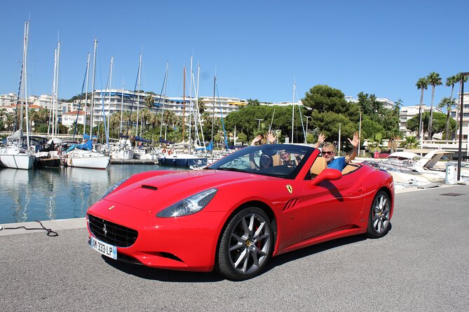 Private Tour on the Roads of Cannes by Ferrari - The Croisette drive: luxury storefronts, hotel façades, and quick viewpoints